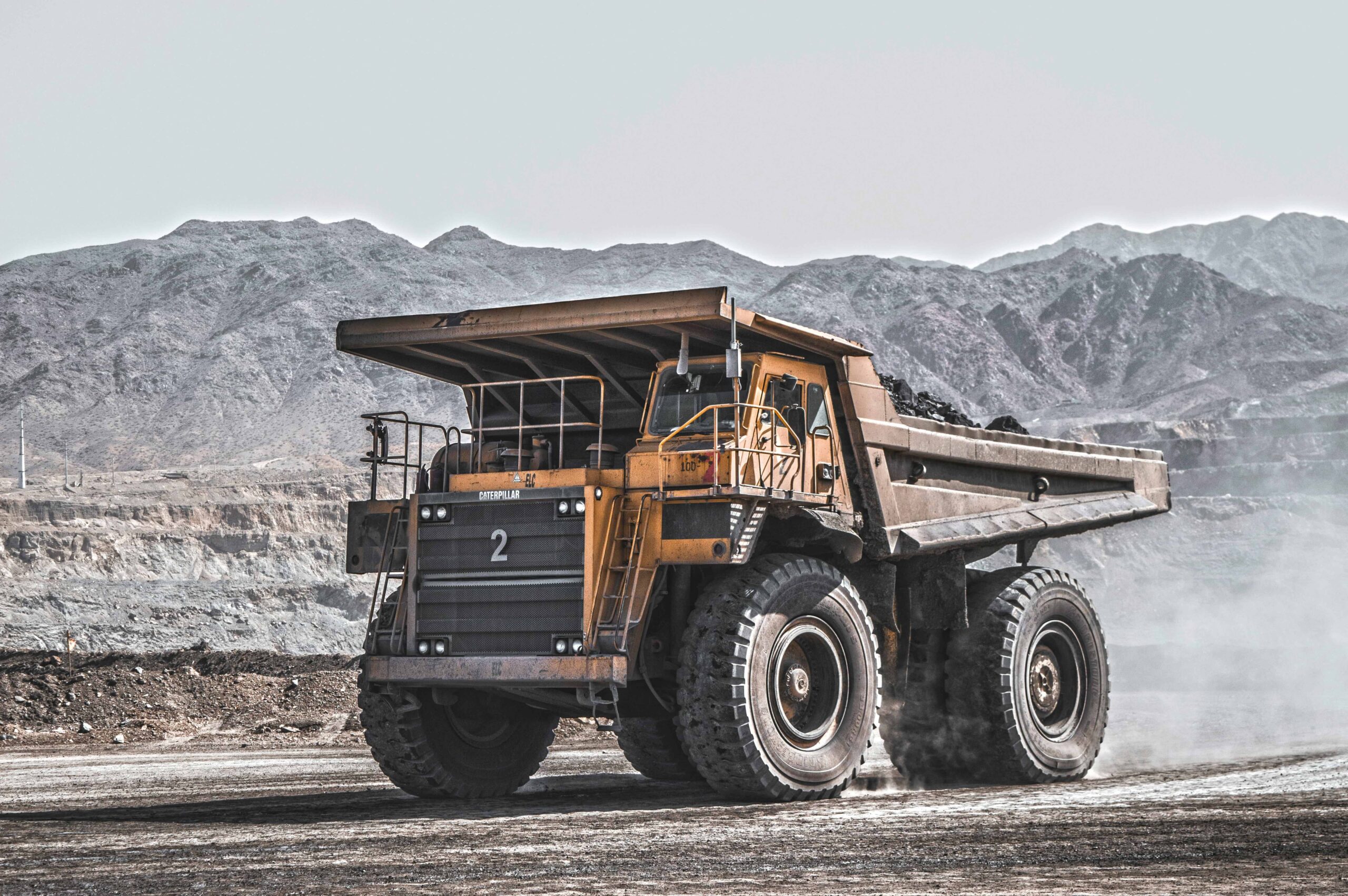 Mining truck driving in a mine.