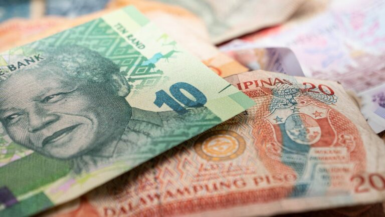 South African Rand banknotes featuring Nelson Mandela, representing government bonds and fixed income investing